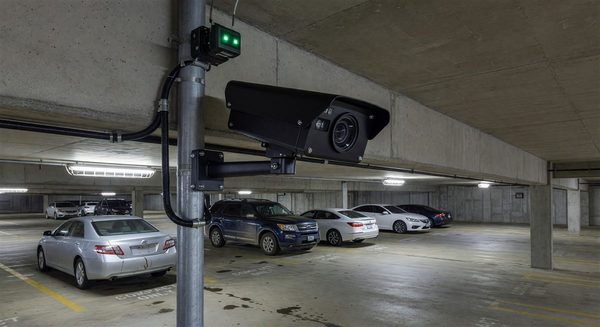 Computer vision camera system mounted in a parking garage detecting vehicle occupancy