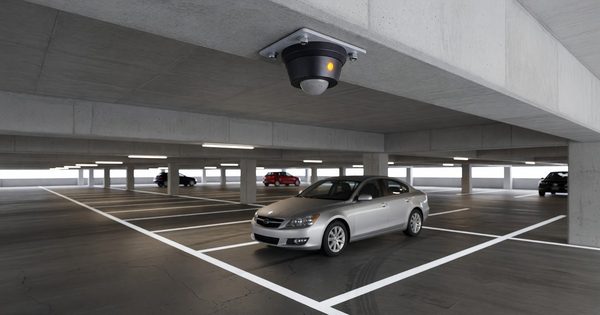 Parking occupancy sensor installed above a parking space