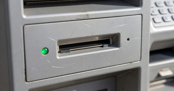 Close inspection of a parking pay station card reader for skimmers